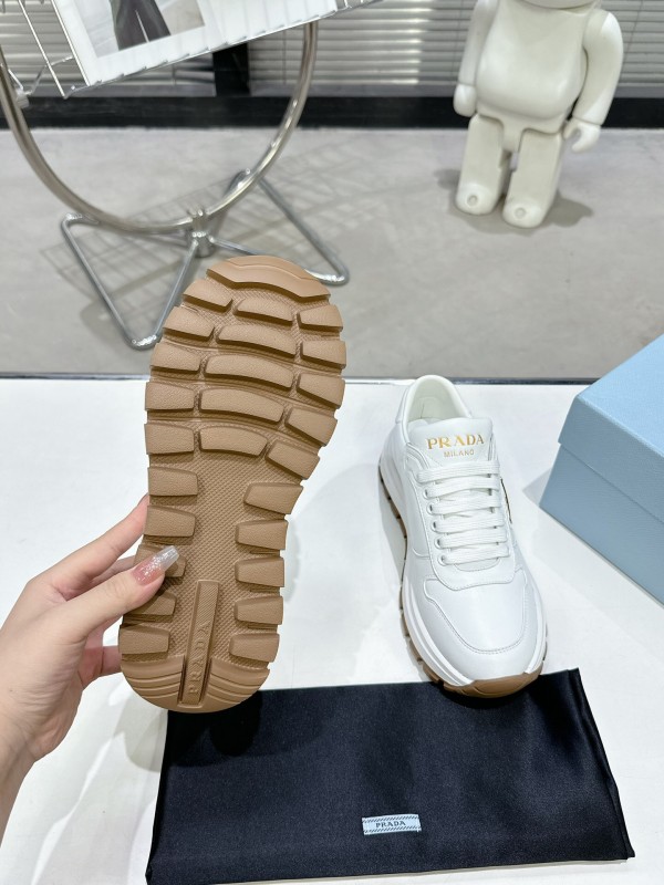 2025 Women Prada White Cow Leather Lambskin Sneakers KFY00310